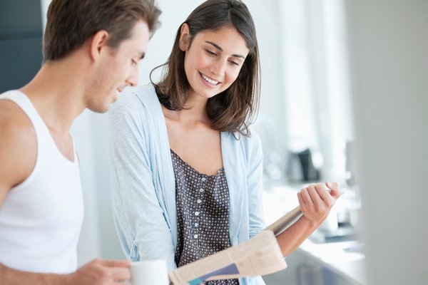 Couple reading the newspaper