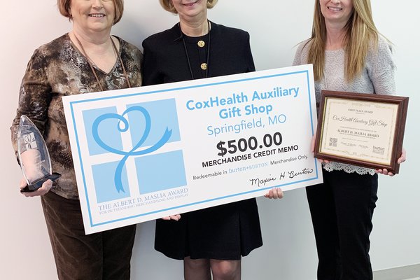 The Albert D. Maslia Award was presented to representatives from Cox South's Auxiliary Gift Shop.