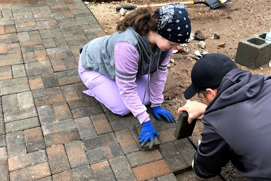 A group of volunteers serves at Eden Village.