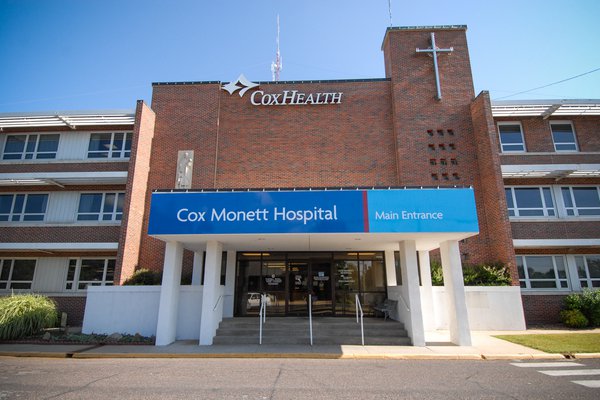 An image shows the 1953 Cox Monett Hospital.