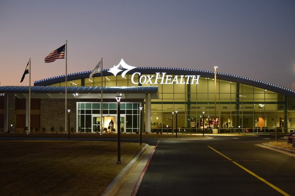 An image shows the front of the new Cox Monett Hospital.