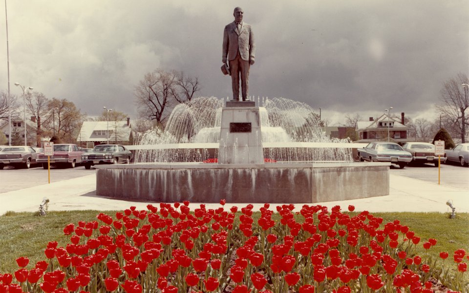 A historic photo of the Cox North fountain surrounded by red tulips