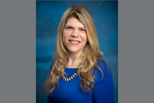 A headshot shows Kaitlyn McConnell.