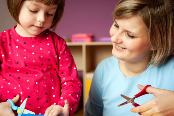 Mom and daughter sewing