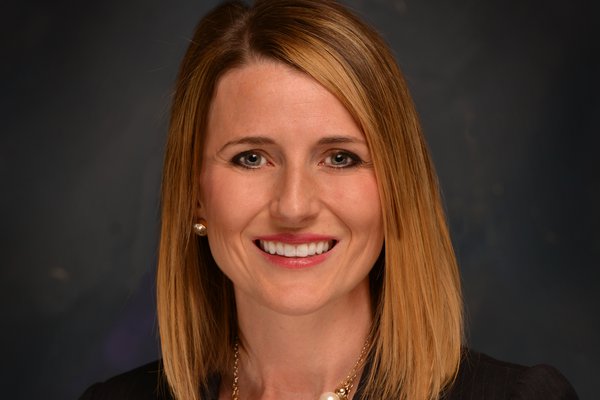 A headshot shows Teresa Coyan.