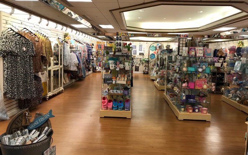 Clothing displays inside the gift shop at Cox South