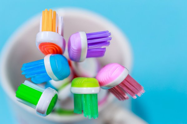 A photo shows a number of toothbrushes.