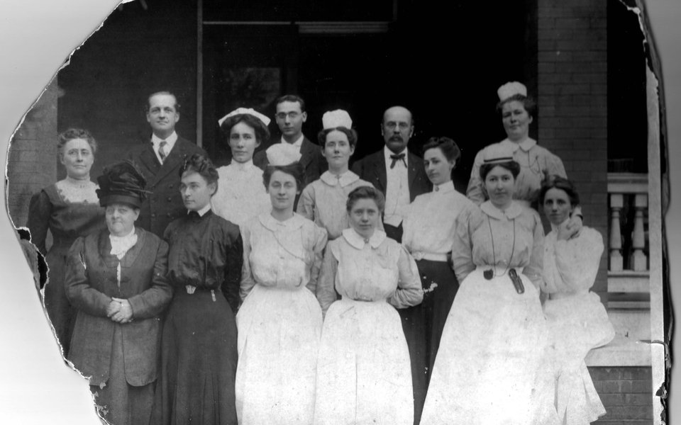 A historic photo of a group of CoxHealth nurses in the early 1900s
